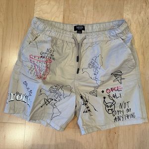 Tan street wear shorts by Man BoohooMan size large. I normally wear a size 33.